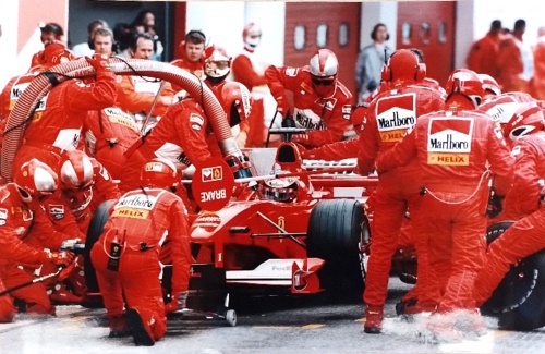 Michael Schumacher Ferrari F1-2000. GP Imola 2000 Pit Stop.  Original Photo Pape